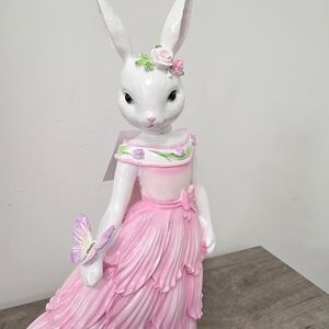 Easter Bunny Girl in Beautiful Dress Pink Bow Holding a Butterfly